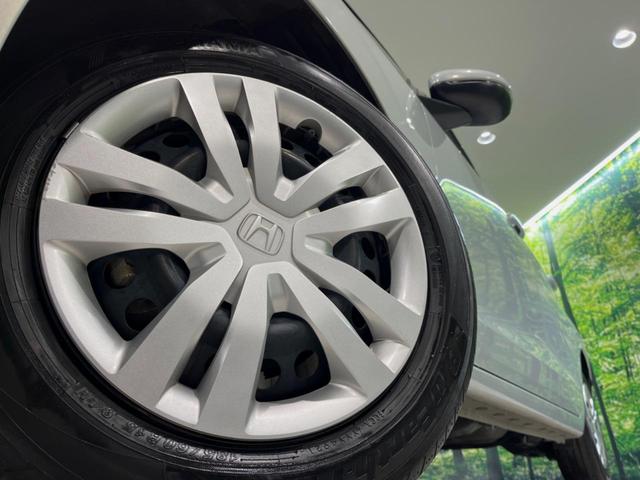 フィット ｅ：ＨＥＶホーム　純正９型ナビ　バックカメラ　衝突被害軽減システム　レーダークルーズ　ハーフレザーシート　ドラレコ　コーナーセンサー　スマートキー　ＬＥＤヘッド　ビルトインＥＴＣ　オートハイビーム　車線逸脱警報（12枚目）