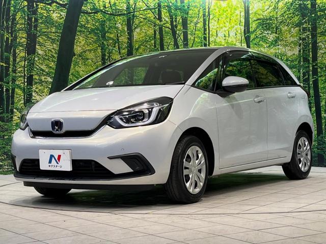 フィット ｅ：ＨＥＶホーム　純正９型ナビ　バックカメラ　衝突被害軽減システム　レーダークルーズ　ハーフレザーシート　ドラレコ　コーナーセンサー　スマートキー　ＬＥＤヘッド　ビルトインＥＴＣ　オートハイビーム　車線逸脱警報（42枚目）