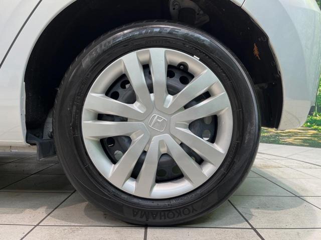 フィット ｅ：ＨＥＶホーム　純正９型ナビ　バックカメラ　衝突被害軽減システム　レーダークルーズ　ハーフレザーシート　ドラレコ　コーナーセンサー　スマートキー　ＬＥＤヘッド　ビルトインＥＴＣ　オートハイビーム　車線逸脱警報（54枚目）