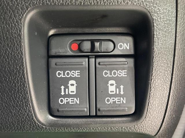 N-BOXカスタム G・ターボLパッケージ 純正ナビ バックカメラ 両側電動ドア 衝突被害軽減システム ハーフレザーシート スマートキー HIDヘッド ETC クルコン 純正15インチアルミ オートライト オートエアコン アイドリングストップ(7枚目)