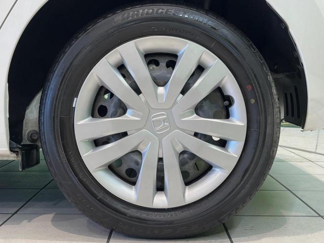 フィット ホーム 純正8型SDナビ バックカメラ 衝突被害軽減システム レーダークルーズ 禁煙車 ハーフレザーシート コーナーセンサー スマートキー LEDヘッド ビルトインETC オートハイビーム 車線逸脱警報(55枚目)