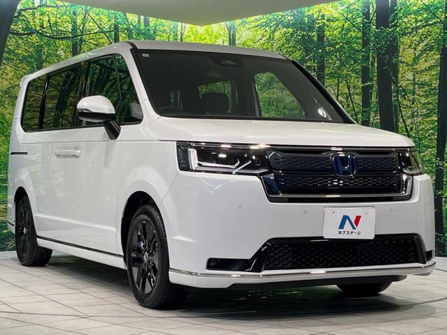 ステップワゴン ｅ：ＨＥＶスパーダ　登録済未使用車　ホンダセンシング　アダプティブクルーズ　両側電動スライドドア　純正１１型ナビ　バックカメラ　フルセグ　Ｂｌｕｅｔｏｏｔｈ　電動リアゲート　禁煙車　ＬＥＤヘッド／フォグ　スマートキー（17枚目）