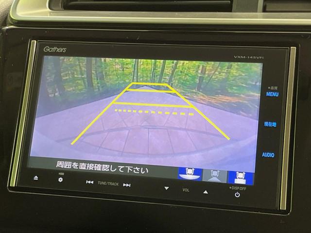 フィットハイブリッド Lパッケージ 純正ナビ バックカメラ 衝突被害軽減ブレーキ 禁煙車 ハーフレザーシート スマートキー LEDヘッド ビルトインETC クルコン オートライト オートエアコン Bluetooth ドラレコ(4枚目)