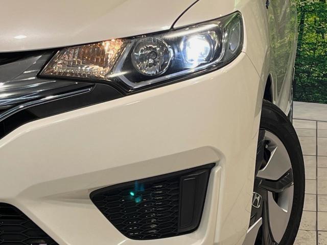 フィットハイブリッド Lパッケージ 純正ナビ バックカメラ 衝突被害軽減ブレーキ 禁煙車 ハーフレザーシート スマートキー LEDヘッド ビルトインETC クルコン オートライト オートエアコン Bluetooth ドラレコ(12枚目)