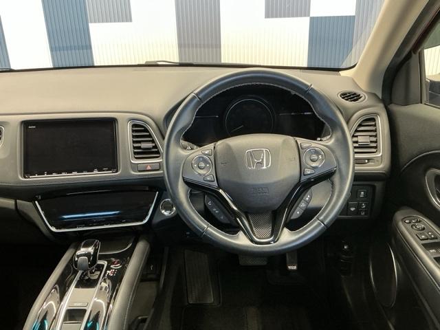 ヴェゼル ハイブリッドＺ・ホンダセンシング　ホンダ認定中古車　純正ドラレコ前後　レーダーサポート　Ｗエアコン　１オーナ－　ＤＶＤ再生機能　整備記録簿　横滑り防止システム　バックアイカメラ　盗難防止装置　フルセ　シートヒーター付　スマ－トキ－（18枚目）