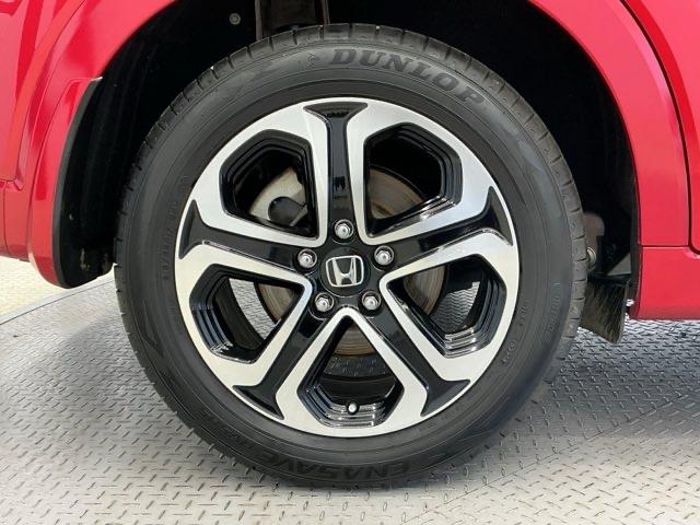 ヴェゼル ハイブリッドＺ・ホンダセンシング　ホンダ認定中古車　純正ドラレコ前後　レーダーサポート　Ｗエアコン　１オーナ－　ＤＶＤ再生機能　整備記録簿　横滑り防止システム　バックアイカメラ　盗難防止装置　フルセ　シートヒーター付　スマ－トキ－（23枚目）