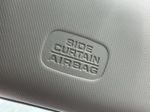 フリード エアーＥＸ　ホンダ認定中古車　両側電動　ＬＥＤ　バックモニター　盗難防止システム　両側パワースライドドア　横滑り防止装置　クルコン　フルセグ　オートエアコン　３列シート　クリソナ　サイドエアバッグ　ウォークスルー（11枚目）