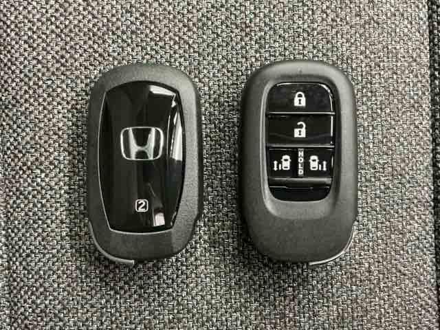 フリード エアーＥＸ　ホンダ認定中古車　両側電動　ＬＥＤ　バックモニター　盗難防止システム　両側パワースライドドア　横滑り防止装置　クルコン　フルセグ　オートエアコン　３列シート　クリソナ　サイドエアバッグ　ウォークスルー（16枚目）