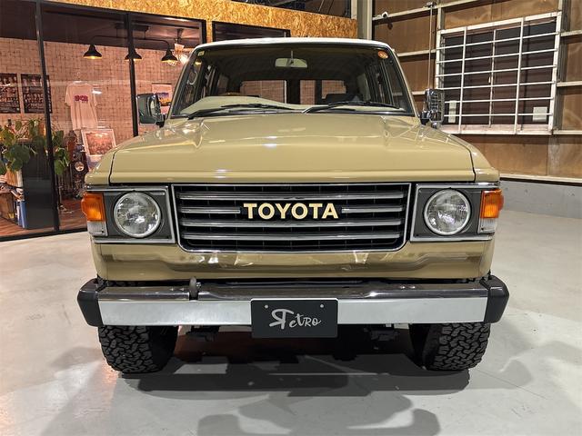 ランドクルーザー６０ ＧＸ　ディーゼル　５速マニュアル　ロールーフ　平屋根　リア観音　　丸目ヘッドライト　純正１６インチホイール　ナルディウッドステアリング　フルセグメモリーナビ（2枚目）