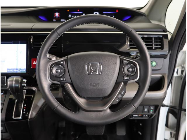 ステップワゴンスパーダ スパーダホンダセンシング 盗難防止 助手席エアバッグ Wパワスラ 地デジ LEDライト 横滑り防止システム オートエアコン リアカメラ ドライブレコーダー装着車 USB ナビ&TV 三列シート(16枚目)