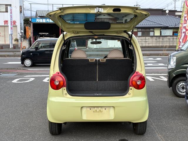 ムーヴラテ Ｌ　キーレスエントリー　電動格納ミラー　ベンチシート　ＡＴ　盗難防止システム　ＣＤ　ＭＤ　衝突安全ボディ　エアコン　パワーステアリング　パワーウィンドウ（25枚目）