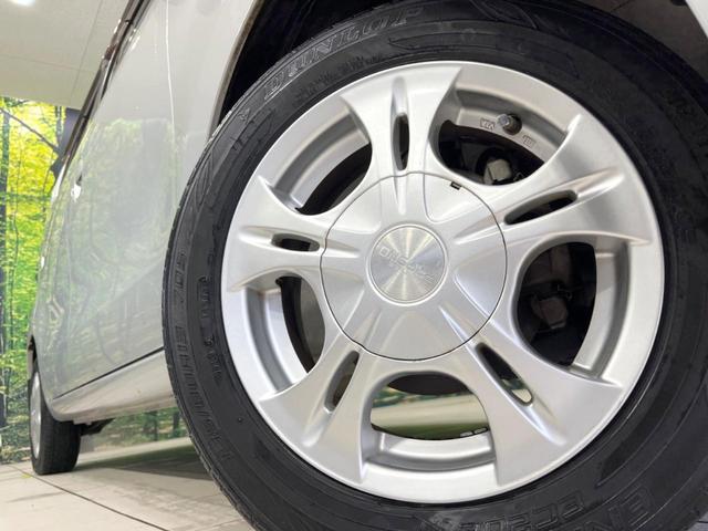 モコ E 禁煙車 ETC オートエアコン キーレス CD再生 電動格納ミラー レベライザー フォグランプ ドアバイザー パワーウィンドウ 盗難防止システム トラクションコントロール プライバシーガラス(12枚目)