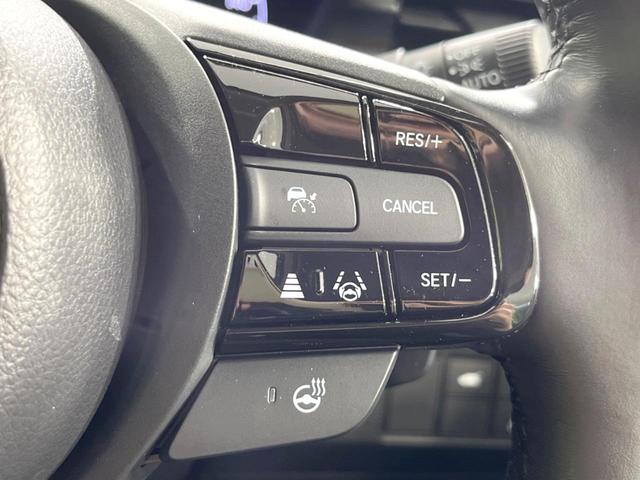 ヴェゼル ｅ：ＨＥＶ　Ｚ　純正９インチナビ　ホンダセンシング　全周囲カメラ　アダプティブクルーズコントロール　ＢＳＭ　電動リアゲート　置くだけ充電　寒冷地仕様　Ｂｌｕｅｔｏｏｔｈ　ＥＴＣ　シートヒーター　ＬＥＤヘッドライト（4枚目）