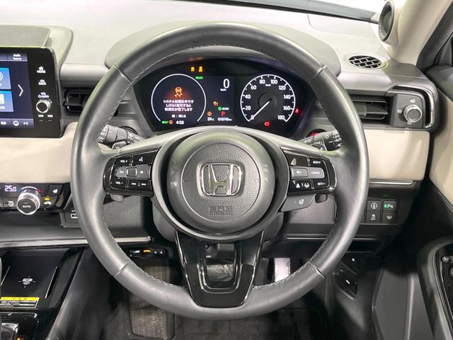 ヴェゼル ｅ：ＨＥＶ　Ｚ　純正９インチナビ　ホンダセンシング　全周囲カメラ　アダプティブクルーズコントロール　ＢＳＭ　電動リアゲート　置くだけ充電　寒冷地仕様　Ｂｌｕｅｔｏｏｔｈ　ＥＴＣ　シートヒーター　ＬＥＤヘッドライト（10枚目）