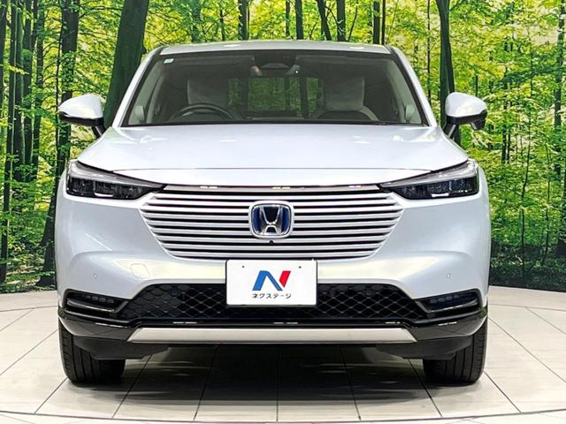 ヴェゼル ｅ：ＨＥＶ　Ｚ　純正９インチナビ　ホンダセンシング　全周囲カメラ　アダプティブクルーズコントロール　ＢＳＭ　電動リアゲート　置くだけ充電　寒冷地仕様　Ｂｌｕｅｔｏｏｔｈ　ＥＴＣ　シートヒーター　ＬＥＤヘッドライト（14枚目）