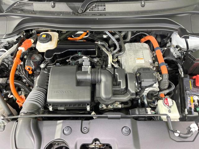ヴェゼル ｅ：ＨＥＶ　Ｚ　純正９インチナビ　ホンダセンシング　全周囲カメラ　アダプティブクルーズコントロール　ＢＳＭ　電動リアゲート　置くだけ充電　寒冷地仕様　Ｂｌｕｅｔｏｏｔｈ　ＥＴＣ　シートヒーター　ＬＥＤヘッドライト（18枚目）