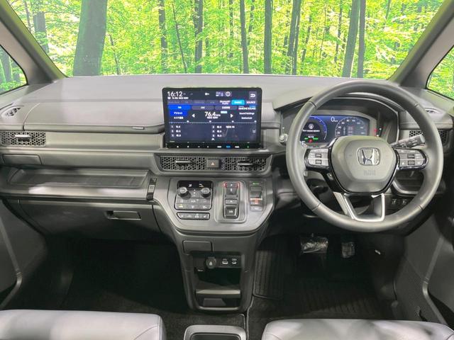 ステップワゴン e:HEVスパーダ 純正11.4インチナビ 両側電動ドア 全周囲カメラ ホンダセンシング 禁煙車 ETC 電動リアゲート ドラレコ 2列目オットマン 前席シートヒーター アダプティブクルーズ コーナーセンサー フルセグ(2枚目)