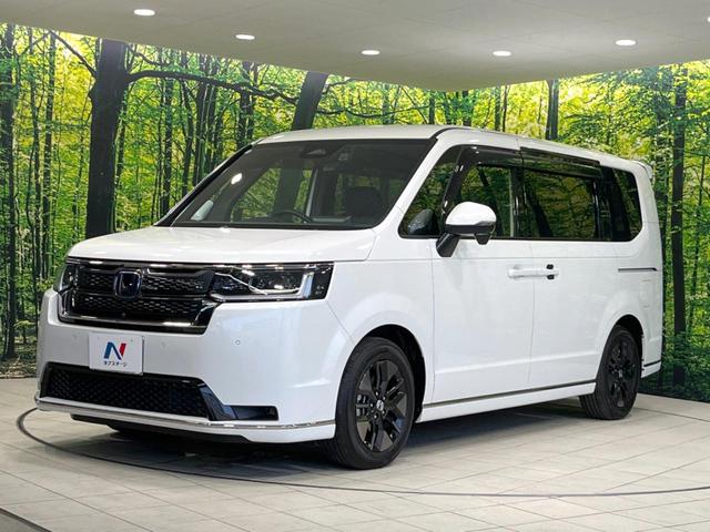 ステップワゴン e:HEVスパーダ 純正11.4インチナビ 両側電動ドア 全周囲カメラ ホンダセンシング 禁煙車 ETC 電動リアゲート ドラレコ 2列目オットマン 前席シートヒーター アダプティブクルーズ コーナーセンサー フルセグ(25枚目)