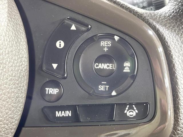 N-WGN Lホンダセンシング 純正SDナビ 衝突被害軽減システム レーダークルーズ 禁煙車 スマートキー LEDヘッド ビルトインETC オートハイビーム 車線逸脱警報 オートエアコン Bluetooth CD DVD再生(5枚目)