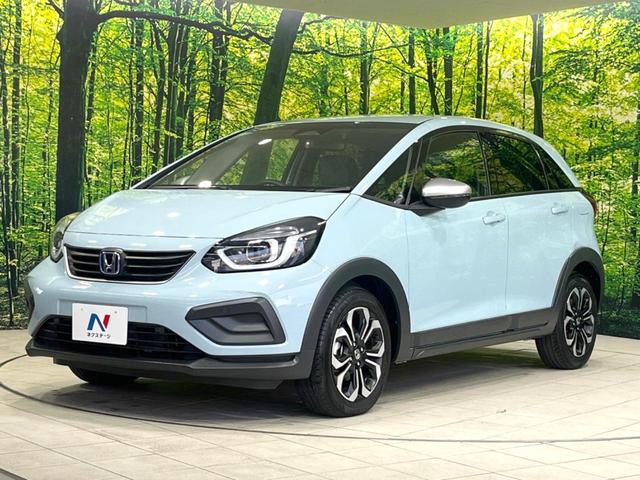 フィット ｅ：ＨＥＶクロスター　純正９型ナビ　バックカメラ　衝突被害軽減システム　ＥＴＣ　レーダークルーズ　禁煙車　ドラレコ　コーナーセンサー　スマートキー　ＬＥＤヘッド　オートハイビーム　車線逸脱警報　フルセグ　プライバシーガラス（25枚目）