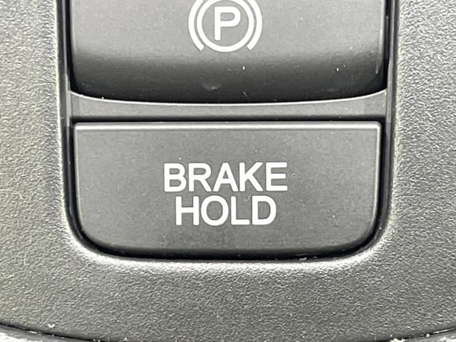 フィット ｅ：ＨＥＶクロスター　純正９型ナビ　バックカメラ　衝突被害軽減システム　ＥＴＣ　レーダークルーズ　禁煙車　ドラレコ　コーナーセンサー　スマートキー　ＬＥＤヘッド　オートハイビーム　車線逸脱警報　フルセグ　プライバシーガラス（57枚目）