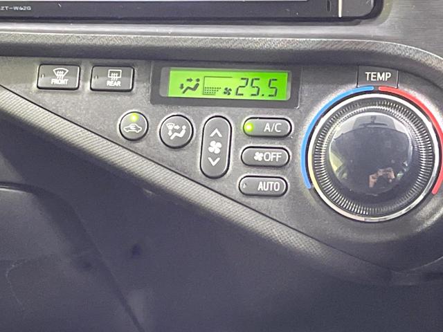 アクア Ｇ　純正ナビ　禁煙車　バックカメラ　ＥＴＣ　フルセグ　Ｂｌｕｅｔｏｏｔｈ　スマートキー　オートライト　ステアリングスイッチ　オートエアコン　盗難防止装置　プライバシーガラス　アイドリングストップ　横滑防止（7枚目）