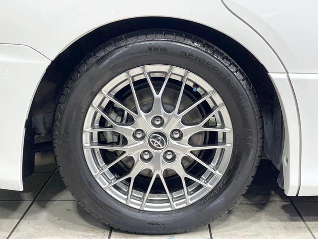 ノア ハイブリッドSi ダブルバイビー 両側電動ドア SDナビ 後席モニター バックカメラ 寒冷地仕様 衝突被害軽減システム 禁煙車 ハーフレザーシート ドラレコ スマートキー LEDヘッド ETC クルコン 純正16インチアルミ(27枚目)