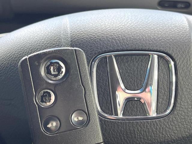 フリードハイブリッド ジャストセレクション　両側電動ドア　純正ＳＤナビ　バックカメラ　禁煙車　ドラレコ　スマートキー　ＨＩＤヘッド　ビルトインＥＴＣ　クルコン　オートライト　オートエアコン　ＣＤ　ＤＶＤ再生　フルセグ（7枚目）