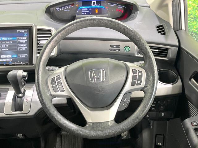 フリードハイブリッド ジャストセレクション　両側電動ドア　純正ＳＤナビ　バックカメラ　禁煙車　ドラレコ　スマートキー　ＨＩＤヘッド　ビルトインＥＴＣ　クルコン　オートライト　オートエアコン　ＣＤ　ＤＶＤ再生　フルセグ（12枚目）