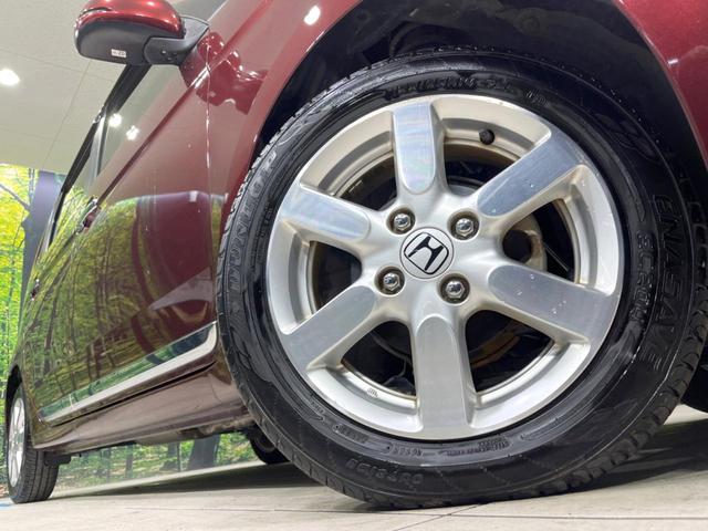 N-ONE プレミアム・Lパッケージ 純正SDナビ バックカメラ 禁煙車 ETC スマートキー HIDヘッドライト CD再生 オートライト アイドリングストップ 電動格納ミラー オートエアコン 15インチAW 盗難防止システム 横滑り防止(12枚目)