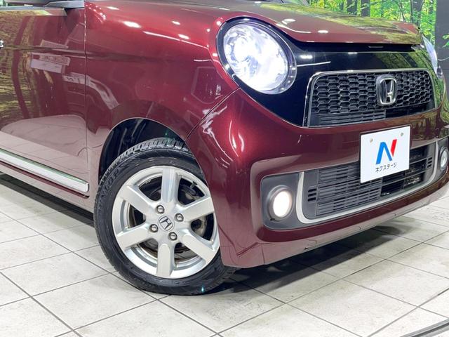 N-ONE プレミアム・Lパッケージ 純正SDナビ バックカメラ 禁煙車 ETC スマートキー HIDヘッドライト CD再生 オートライト アイドリングストップ 電動格納ミラー オートエアコン 15インチAW 盗難防止システム 横滑り防止(13枚目)