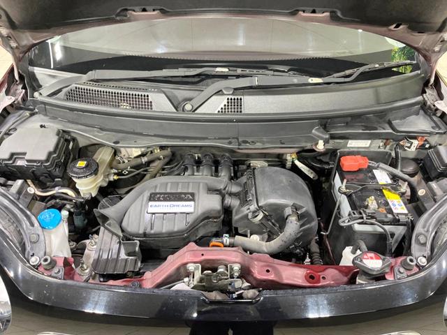 N-ONE プレミアム・Lパッケージ 純正SDナビ バックカメラ 禁煙車 ETC スマートキー HIDヘッドライト CD再生 オートライト アイドリングストップ 電動格納ミラー オートエアコン 15インチAW 盗難防止システム 横滑り防止(18枚目)