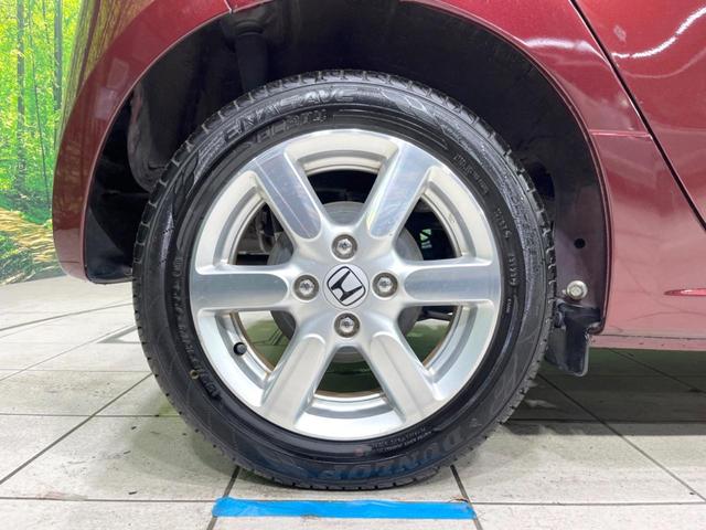 N-ONE プレミアム・Lパッケージ 純正SDナビ バックカメラ 禁煙車 ETC スマートキー HIDヘッドライト CD再生 オートライト アイドリングストップ 電動格納ミラー オートエアコン 15インチAW 盗難防止システム 横滑り防止(54枚目)