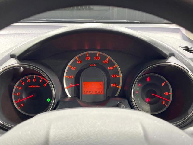 フィット Ｇ・１０ｔｈアニバーサリーＩＩ　バックカメラ　禁煙車　ＨＩＤヘッドライト　ビルトインＥＴＣ　オートライト　ＣＤ再生　プライバシーガラス　アイドリングストップ（53枚目）