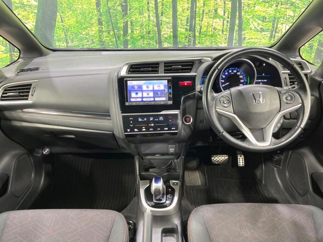 フィットハイブリッド Ｓパッケージ　純正ＳＤナビ　バックカメラ　寒冷地仕様　衝突被害軽減システム　禁煙車　ドラレコ　スマートキー　ＬＥＤヘッド　ＥＴＣ　クルコン　純正１６インチアルミ　オートライト　オートエアコン　Ｂｌｕｅｔｏｏｔｈ（2枚目）