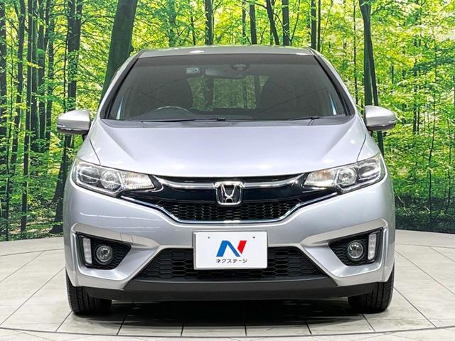 フィットハイブリッド Ｓパッケージ　純正ＳＤナビ　バックカメラ　寒冷地仕様　衝突被害軽減システム　禁煙車　ドラレコ　スマートキー　ＬＥＤヘッド　ＥＴＣ　クルコン　純正１６インチアルミ　オートライト　オートエアコン　Ｂｌｕｅｔｏｏｔｈ（14枚目）