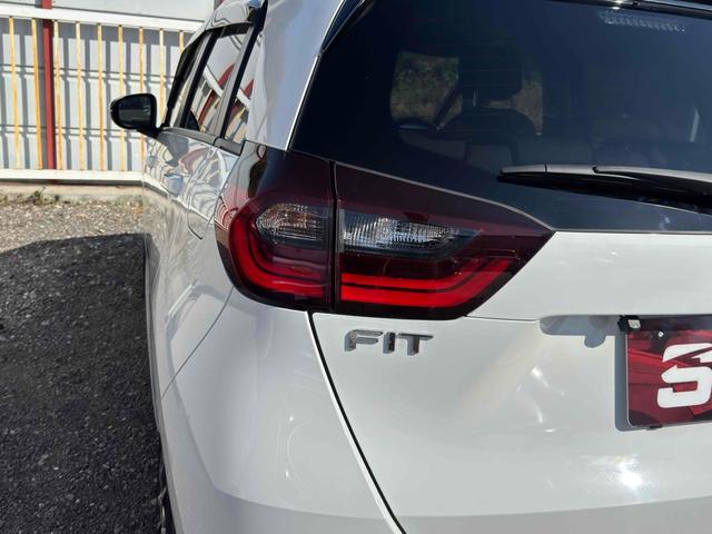 フィット ｅ：ＨＥＶベーシック　ドライブレコーダー　ＥＴＣ　バックカメラ　ナビ　クリアランスソナー　オートクルーズコントロール　レーンアシスト　衝突被害軽減システム　アルミホイール　オートライト　ＬＥＤヘッドランプ　スマートキー（10枚目）