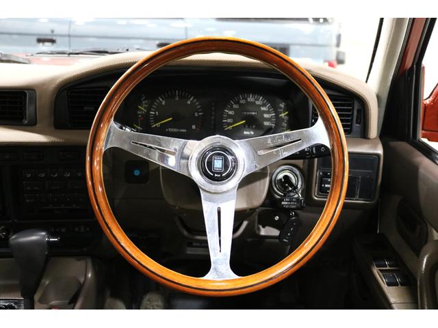 ランドクルーザー80 VXリミテッド オールペイント済み レッドロック 丸目フェイス WONDERDEEN 16インチアルミホイール BFグッドリッチ ATタイヤファブリックシートカバー 社外ナビ ダッシュボードレザー張替FLEXマフラー(56枚目)