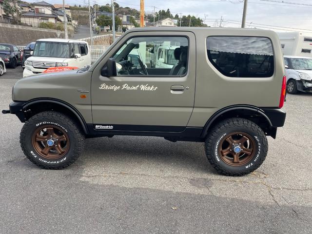 ジムニー ワイルドウインド 社外ナビ バックカメラ 色替え 2.5インチアップ 社外マフラー 社外ステアリング ETC(4枚目)