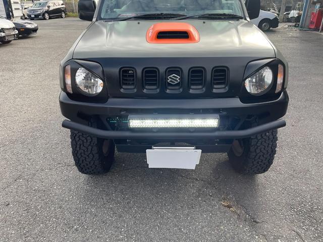 ジムニー ワイルドウインド 社外ナビ バックカメラ 色替え 2.5インチアップ 社外マフラー 社外ステアリング ETC(6枚目)