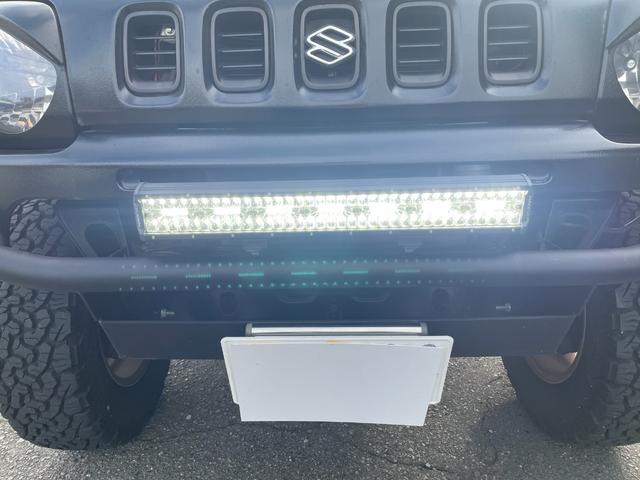 ジムニー ワイルドウインド 社外ナビ バックカメラ 色替え 2.5インチアップ 社外マフラー 社外ステアリング ETC(7枚目)