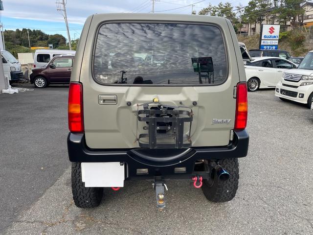 ジムニー ワイルドウインド 社外ナビ バックカメラ 色替え 2.5インチアップ 社外マフラー 社外ステアリング ETC(9枚目)