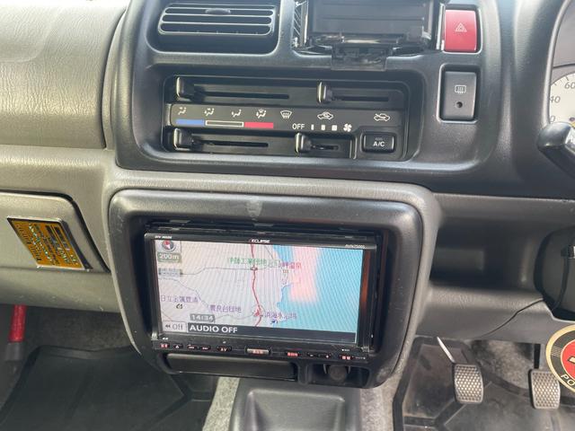 ジムニー ワイルドウインド 社外ナビ バックカメラ 色替え 2.5インチアップ 社外マフラー 社外ステアリング ETC(12枚目)