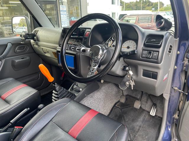 ジムニー ワイルドウインド 社外ナビ バックカメラ 色替え 2.5インチアップ 社外マフラー 社外ステアリング ETC(14枚目)