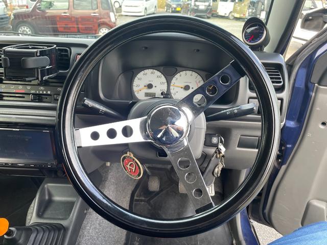 ジムニー ワイルドウインド 社外ナビ バックカメラ 色替え 2.5インチアップ 社外マフラー 社外ステアリング ETC(15枚目)