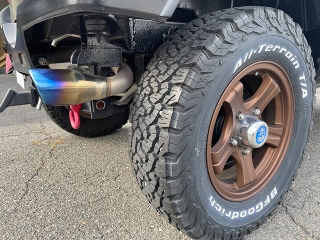 ジムニー ワイルドウインド 社外ナビ バックカメラ 色替え 2.5インチアップ 社外マフラー 社外ステアリング ETC(30枚目)