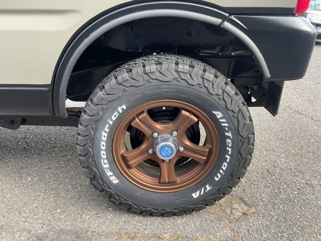 ジムニー ワイルドウインド 社外ナビ バックカメラ 色替え 2.5インチアップ 社外マフラー 社外ステアリング ETC(32枚目)