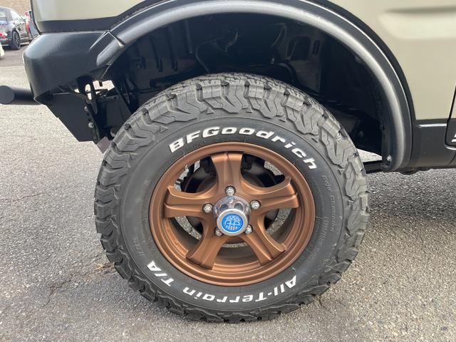 ジムニー ワイルドウインド 社外ナビ バックカメラ 色替え 2.5インチアップ 社外マフラー 社外ステアリング ETC(33枚目)