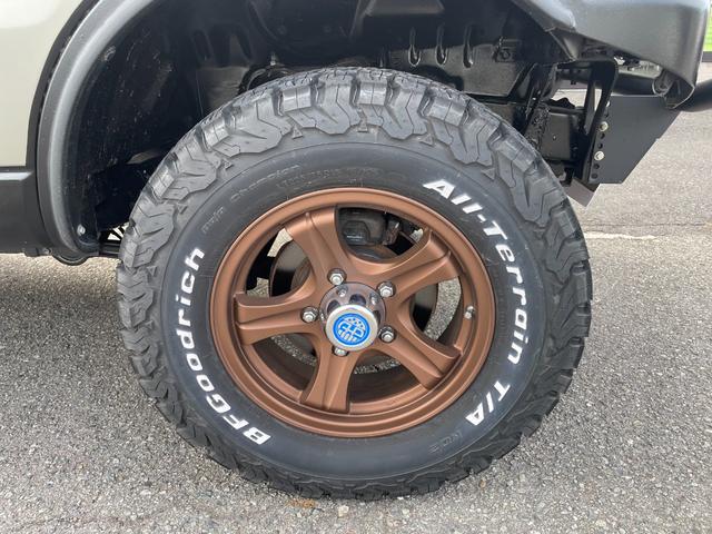 ジムニー ワイルドウインド 社外ナビ バックカメラ 色替え 2.5インチアップ 社外マフラー 社外ステアリング ETC(34枚目)