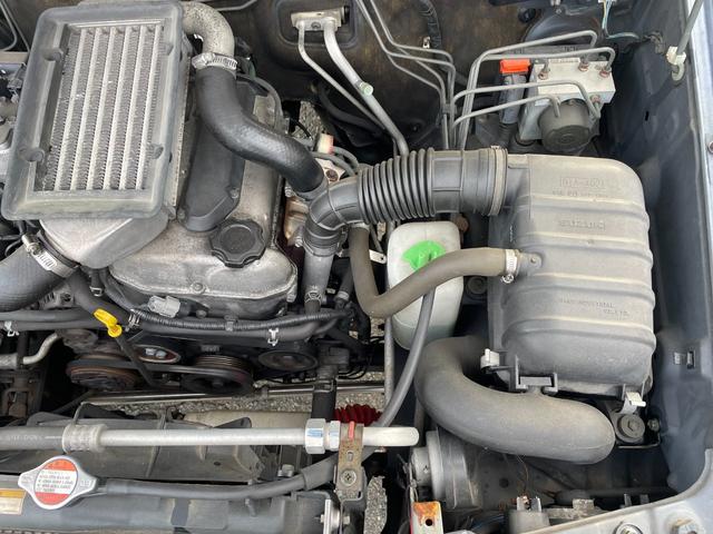 ジムニー ワイルドウインド 社外ナビ バックカメラ 色替え 2.5インチアップ 社外マフラー 社外ステアリング ETC(40枚目)